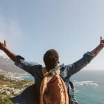 Man enjoying the view from top of mountain